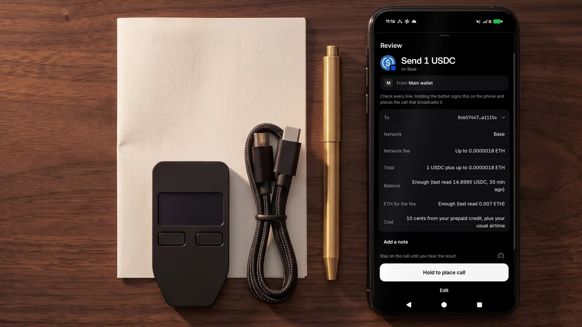 A hardware wallet beside a phone showing the TELRPC Wallet review sheet